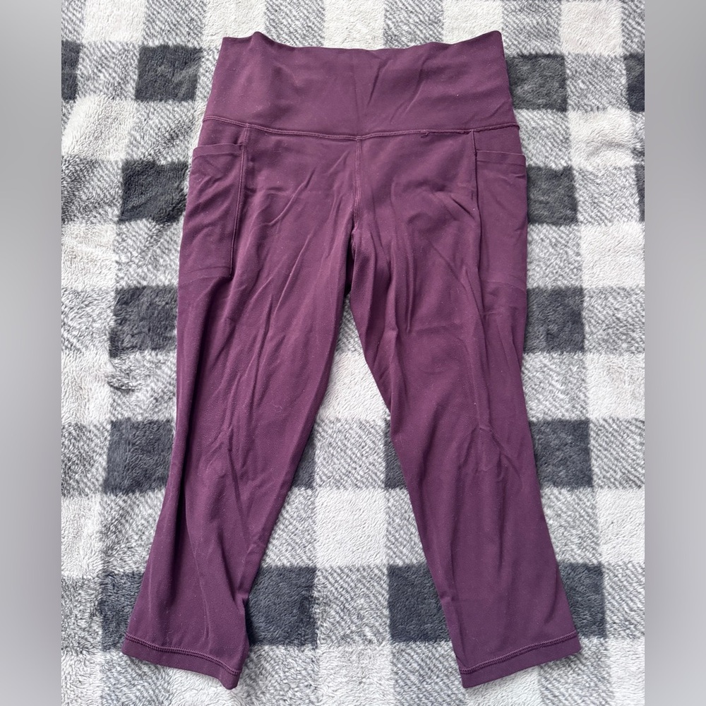 Athleta Burgundy Capri Salutation Stash Pocket Leggings -Medium